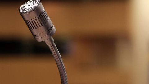 Illustrative photo: microphone, speech, lecture